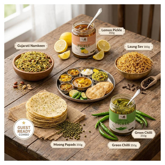 Maa Kaa Achar Atithi Satkar Combo including Moong Papads, Green Chilli Pickle, Lemon Pickle, Gujarati Namkeen, and Laung Sev for gifting and family meals. 