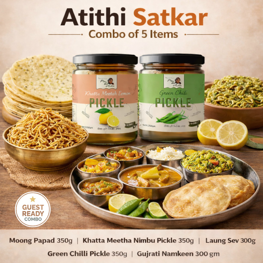 Maa Kaa Achar Atithi Satkar bundle with papad, pickle, and namkeen, displayed in a colorful traditional Indian snack set.